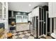 Well-appointed kitchen featuring white cabinets, stainless steel appliances, and granite countertops at 5922 Broadway St, Indianapolis, IN 46220
