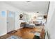 Inviting living room features hardwood floors, a large sectional sofa, and stylish decor at 5922 Broadway St, Indianapolis, IN 46220