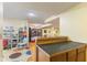 Open basement space with study area and bar space at 5986 Regency Dr, Columbus, IN 47203