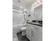 Stylish bathroom featuring subway tile, a glass-enclosed shower, and a modern vanity at 5986 Regency Dr, Columbus, IN 47203