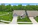 Gorgeous aerial view of the home, showcasing its landscaped yard and proximity to beautiful lush trees at 6536 Apperson Dr, Noblesville, IN 46060