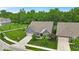 A well-maintained house is surrounded by a lush green lawn and mature trees, offering privacy at 6536 Apperson Dr, Noblesville, IN 46060