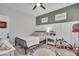 Inviting bedroom with a comfortable bed, a window, and neutral decor at 6536 Apperson Dr, Noblesville, IN 46060