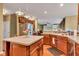 Bright kitchen with a central island, modern appliances, and a functional layout perfect for cooking and entertaining at 705 Ridge Gate Dr, Brownsburg, IN 46112