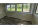 Sun room with neutral walls, multi-pane windows, and vinyl flooring at 711 W Centennial Ave, Muncie, IN 47303