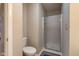 Bathroom features a standard toilet and a glass door shower at 7150 Eagle Cove Dr, Indianapolis, IN 46254