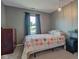 Comfortable bedroom features a pond view from the window, carpet and dressers at 7150 Eagle Cove Dr, Indianapolis, IN 46254