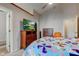 Cozy bedroom with an area for TV, wooden dressers, and large doorways to other rooms at 7150 Eagle Cove Dr, Indianapolis, IN 46254