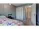 Bedroom featuring carpet, closet and doorways to other rooms in the house at 7150 Eagle Cove Dr, Indianapolis, IN 46254