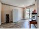 Large bonus room features wood laminate flooring, a refreshment center and a great view of the back yard at 7150 Eagle Cove Dr, Indianapolis, IN 46254
