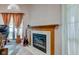 This living room features a fireplace, large windows, and cozy design elements for a relaxing atmosphere at 7150 Eagle Cove Dr, Indianapolis, IN 46254
