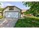 Charming single-story home featuring a well-maintained lawn and an attached two-car garage at 7150 Eagle Cove Dr, Indianapolis, IN 46254