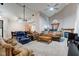 Spacious living room with a fireplace, comfortable seating, and an open layout for entertaining at 7150 Eagle Cove Dr, Indianapolis, IN 46254