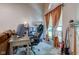 A cozy home office featuring natural light, and comfortable furnishings for a productive workspace at 7150 Eagle Cove Dr, Indianapolis, IN 46254