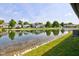 Backyard pond view, showcasing the community and highlighting its desirable setting at 7150 Eagle Cove Dr, Indianapolis, IN 46254
