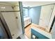 Contemporary bathroom with tiled walk-in shower and white vanity for a clean, modern look at 725 N State Road 75, Lebanon, IN 46052