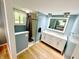 Renovated bathroom with double vanity, shower, and modern fixtures; light and airy at 725 N State Road 75, Lebanon, IN 46052
