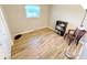 Bedroom with hardwood floors, natural light, and stylish decor at 725 N State Road 75, Lebanon, IN 46052