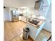 Modern kitchen with stainless steel appliances, gas cooktop, and bright cabinetry at 725 N State Road 75, Lebanon, IN 46052