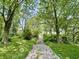 Pathway through a lush green landscape, inviting exploration and natural beauty at 725 N State Road 75, Lebanon, IN 46052