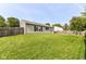 Backyard featuring well maintained lawn, wooden fence, and vinyl siding at 7639 Foxglove Ln, Noblesville, IN 46062