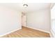 Well lit bedroom with wood flooring and white trim at 7639 Foxglove Ln, Noblesville, IN 46062
