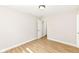 Bright bedroom with wood flooring, white walls and a ceiling light at 7639 Foxglove Ln, Noblesville, IN 46062