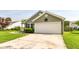 Well-maintained home with an attached two-car garage and neat landscaping with a black star on the front at 7639 Foxglove Ln, Noblesville, IN 46062