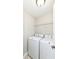 Utility room featuring a white washer and dryer with wire shelving at 7639 Foxglove Ln, Noblesville, IN 46062