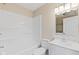 Bathroom featuring a bathtub with shower, toilet and a vanity with mirror and lights at 7928 Vontress St, Coatesville, IN 46121