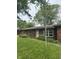 Ranch home with brick and nice big front yard that need some landscaping at 8312 Lamira Ln, Indianapolis, IN 46234