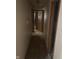 Hallway showing multiple open doors; renovation in progress at 8312 Lamira Ln, Indianapolis, IN 46234