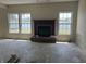 Living room featuring a fireplace and a scenic lake view at 847 Sylvan St, Whiteland, IN 46184