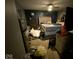 Bedroom featuring a plush king-size bed and a dark blue accent wall at 902 St Andrews Dr, Avon, IN 46123