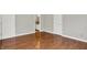 Bedroom with hardwood floors and a bathroom at 9055 Glass Chimney Ln, Fishers, IN 46037