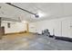 Spacious garage featuring an automatic door opener and ample storage space for tools and equipment at 9055 Glass Chimney Ln, Fishers, IN 46037