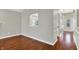 Bright living room features an opening to kitchen at 9055 Glass Chimney Ln, Fishers, IN 46037