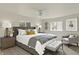 Stylish main bedroom suite with a ceiling fan, neutral colors, and ample sunlight at 9055 Glass Chimney Ln, Fishers, IN 46037