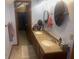 Bathroom featuring a double sink vanity with stylish countertop and mirrors at 920 Corey Ln, Plainfield, IN 46168