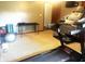 Well-equipped home exercise room with a modern treadmill and fitness accessories at 920 Corey Ln, Plainfield, IN 46168