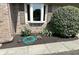 Landscaped flower beds with a garden hose, showing attention to detail and care at 920 Corey Ln, Plainfield, IN 46168