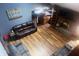 Spacious living room showcasing laminate floors and built-in bookshelves at 920 Corey Ln, Plainfield, IN 46168