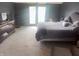 Bright bedroom with large bed and window and dresser with mirror at 920 Corey Ln, Plainfield, IN 46168