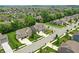 Neighborhood aerial view with neatly lined houses, manicured lawns, and tree-lined streets in a suburban setting at 10113 Gallop Ln, Fishers, IN 46040