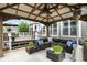 Inviting outdoor space with cushioned seating and a view of the backyard and neighboring home at 10113 Gallop Ln, Fishers, IN 46040