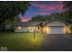 Charming ranch home featuring a well-manicured lawn, attached two car garage, and inviting curb appeal at 110 Leichester Ct, Noblesville, IN 46060