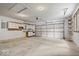 Spacious garage featuring an abundance of storage cabinets and shelving along the side and back walls at 110 Leichester Ct, Noblesville, IN 46060