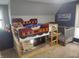 Unique room featuring a bunk bed and crib with ample lighting and cute decorations at 121 N Main St, Pendleton, IN 46064