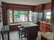 Well-appointed kitchen featuring updated cabinets, stainless appliances and a breakfast bar island at 121 N Main St, Pendleton, IN 46064