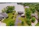 Stunning aerial view of a modern home with lush greenery near a serene lake at 121 Wesley Cir, Noblesville, IN 46062